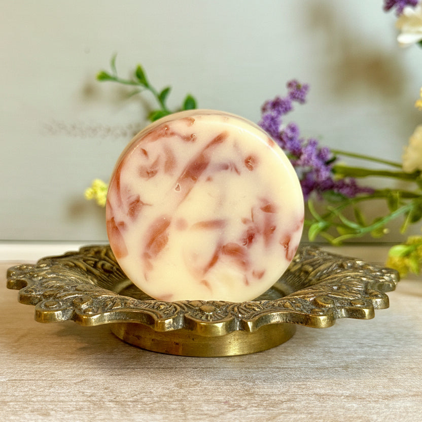 Amber rouge scented soap on a vintage soap dish