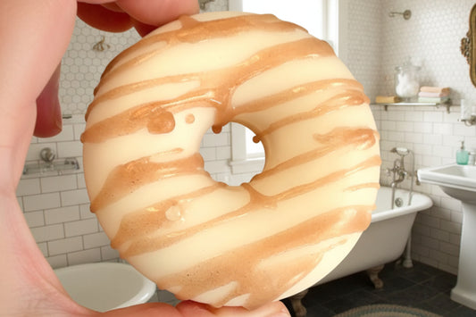 Coconut vanilla scented donut soap with white glaze and brown drizzle